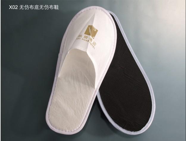 供應(yīng)酒店賓館*一次性無紡布拖鞋 EVA底防滑拖鞋