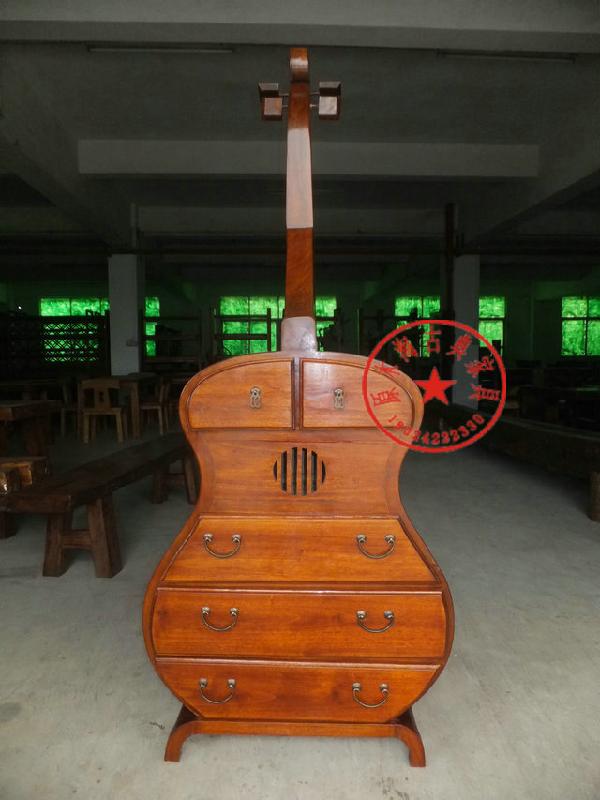 香樟木個(gè)性斗柜概念大提琴柜子圖片