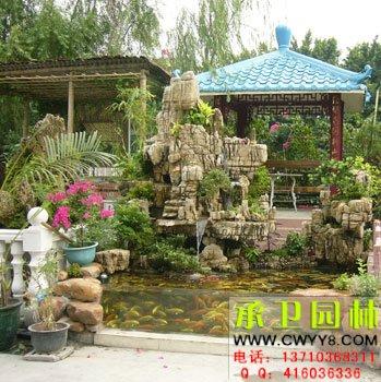 擺設(shè)千層石移動假山魚池圖片