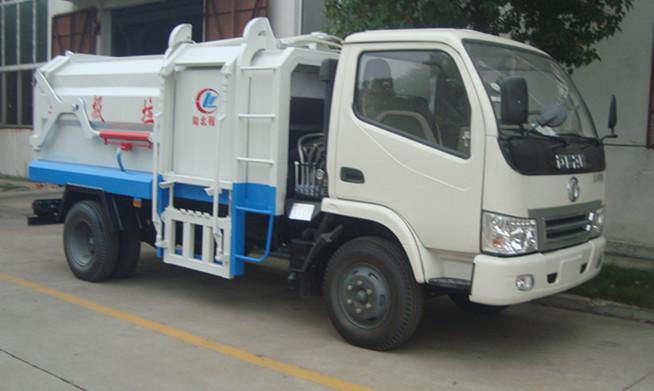 東風(fēng)小霸王側(cè)裝壓縮垃圾車(chē)圖片