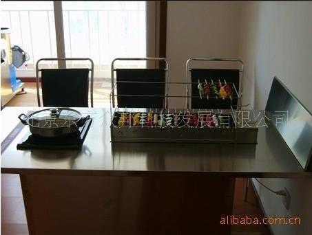 供應(yīng)優(yōu)冠牌小火鍋燒烤桌木炭自動(dòng)燒烤機(jī)