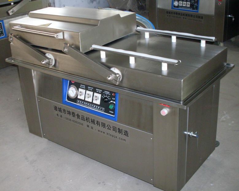山東諸城強(qiáng)大機(jī)械羊肉真空包裝機(jī)圖片