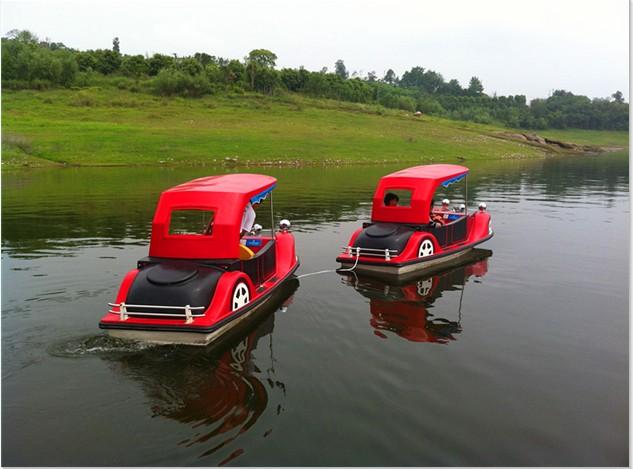 供應(yīng)2014年新款4人老爺船、公園電動(dòng)船、電瓶船生產(chǎn)廠