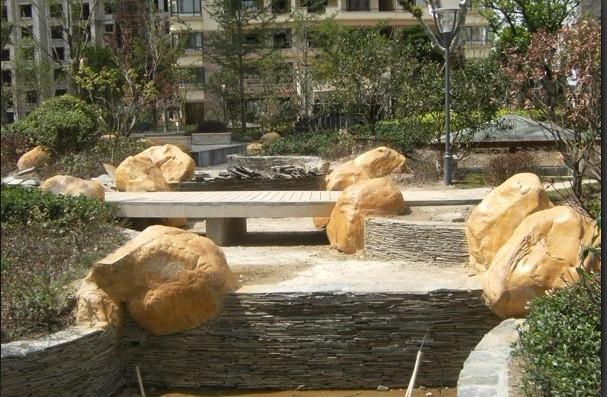 供應(yīng)煙臺小區(qū)道路旁假山假石的裝飾 小區(qū)道路假山塑石假山塑石的裝飾