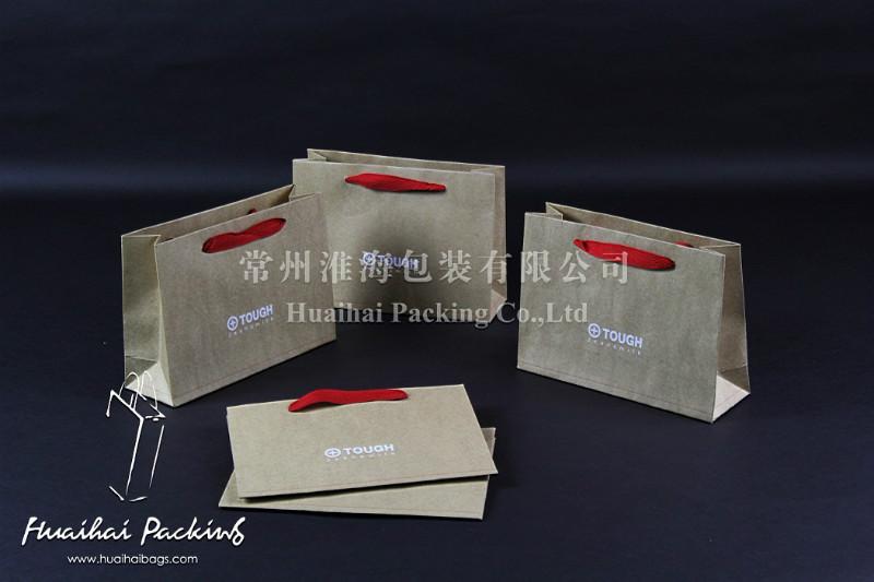供應(yīng)TOUGH服裝手提袋_TOUGH購(gòu)物袋_外貿(mào)服裝袋_牛皮紙袋