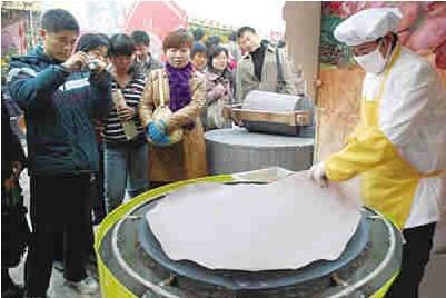 供应山东燃气煎饼鏊子手工杂粮煎饼机旋转式煎饼炉