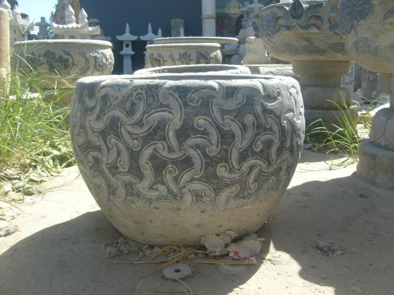 供應(yīng)仿古石頭花盆批發(fā)