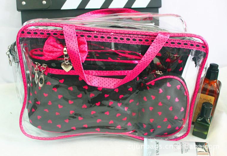 供應金華包包色丁桃心蝴蝶化妝包批發(fā)