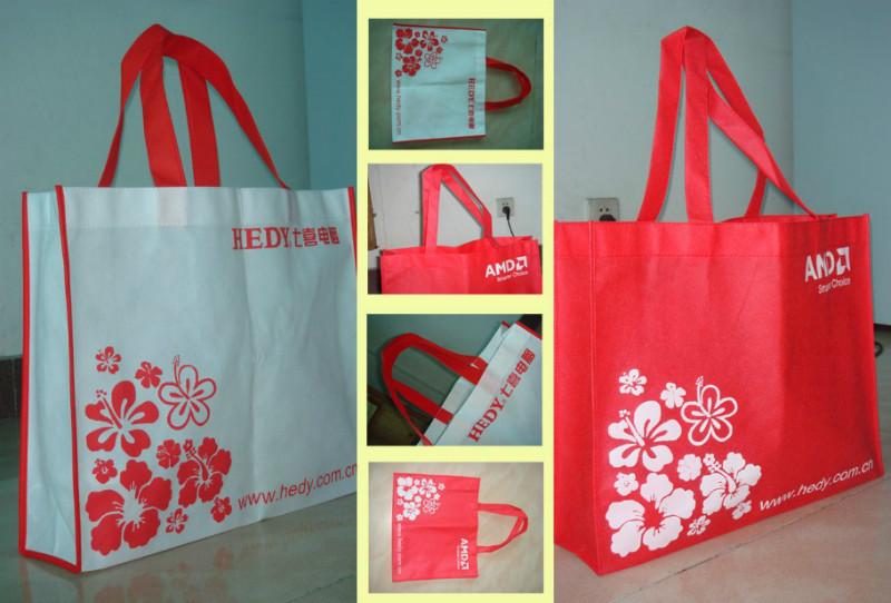 供應(yīng)定做徐州廣告鼠標(biāo)墊無紡布手提袋廣告扇一次性紙杯撲克牌